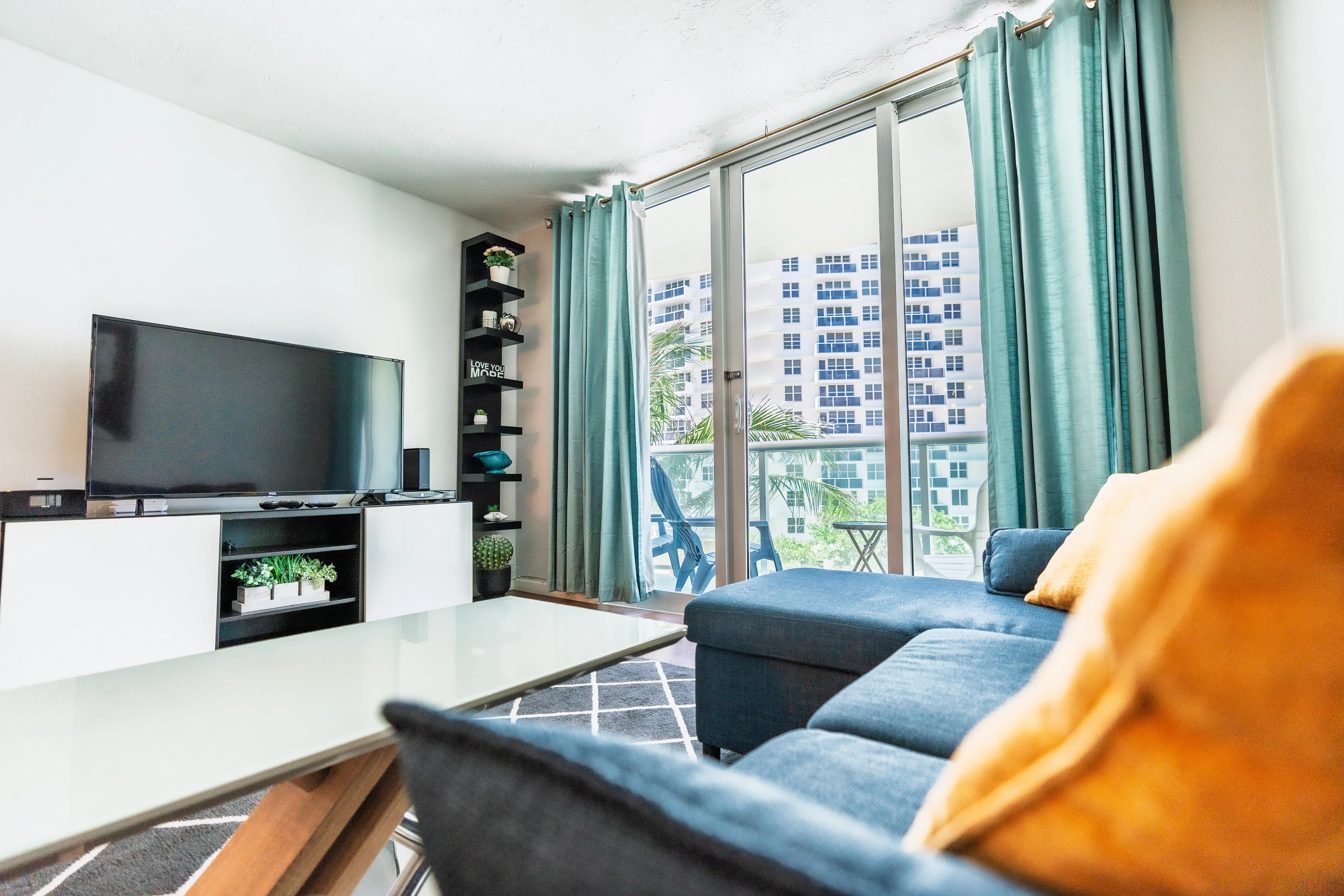 Living room with TV and city view
